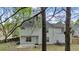 A two-story home features an exterior with a patio and a satellite dish on the roof at 404 Foxwood Ct, Mcdonough, GA 30253
