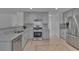 Updated kitchen featuring stainless steel appliances, granite countertops and tile flooring at 404 Foxwood Ct, Mcdonough, GA 30253
