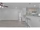 Open-concept layout with kitchen bar and lots of light at 404 Foxwood Ct, Mcdonough, GA 30253