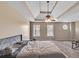 Large main bedroom with ceiling fan and trey ceiling at 404 Foxwood Ct, Mcdonough, GA 30253