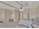 Spacious main bedroom with trey ceiling and neutral walls at 404 Foxwood Ct, Mcdonough, GA 30253
