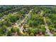 A scenic neighborhood is highlighted, with lush trees surrounding well-kept homes at 404 Foxwood Ct, Mcdonough, GA 30253
