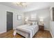 Bedroom featuring hardwood floors and bedside tables at 5125 Dahlonega Hwy, Cumming, GA 30028