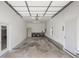 This garage interior offers space for hobbies, complete with storage and ample room for vehicles at 5125 Dahlonega Hwy, Cumming, GA 30028