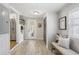 Hallway with access to kitchen, bench seating, and storage at 5125 Dahlonega Hwy, Cumming, GA 30028