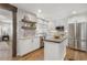 Modern kitchen with stainless steel appliances, subway tile backsplash, and wood countertops at 5125 Dahlonega Hwy, Cumming, GA 30028