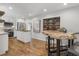 Charming eat in kitchen with a butcher block island, stainless appliances and wine rack at 5125 Dahlonega Hwy, Cumming, GA 30028