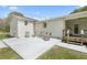 This patio is perfect for entertaining guests with its ample seating and charming string lights at 5125 Dahlonega Hwy, Cumming, GA 30028