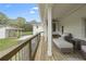 This porch offers plenty of room for relaxing and enjoying the outdoors at 5125 Dahlonega Hwy, Cumming, GA 30028