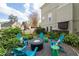 Backyard patio featuring a cozy fire pit and seating, perfect for outdoor entertaining and relaxing at 5334 Lake View Clb, Atlanta, GA 30338