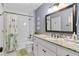 Bathroom features granite counters, modern fixtures, and shower over tub at 5334 Lake View Clb, Atlanta, GA 30338
