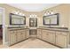 Bathroom features granite counters, double sinks, and neutral color scheme at 5334 Lake View Clb, Atlanta, GA 30338