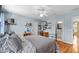 Comfortable bedroom with hardwood floors, natural light, and calming blue walls at 5334 Lake View Clb, Atlanta, GA 30338