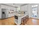 Kitchen with an island, granite countertops, stainless appliances, and white cabinetry at 5334 Lake View Clb, Atlanta, GA 30338
