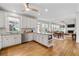 Open kitchen concept with island and eat-in dining, granite countertops, and stainless appliances at 5334 Lake View Clb, Atlanta, GA 30338