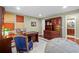Home office with hardwood floors, custom built-ins, and a comfortable desk area at 5334 Lake View Clb, Atlanta, GA 30338
