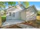 A small backyard with a new fence, a freshly poured concrete patio, and lush green grass at 3527 Clare Cottage Sw Trce, Marietta, GA 30008
