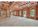 Unfinished basement, framed for future living space with natural light at 3930 Clifton Hill Court #15, Cumming, GA 30040