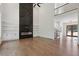 Bright living room featuring a modern fireplace and open floor plan at 3930 Clifton Hill Court #15, Cumming, GA 30040