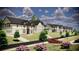 Exterior shot of new construction homes along the street in a new community at 3930 Clifton Hill Court #15, Cumming, GA 30040