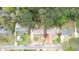 Aerial view of several houses, showcasing the neighborhood, with new brickwork being done at one at 493 James Street Sw, Lilburn, GA 30047