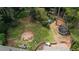 Enjoy this large private backyard featuring a trampoline, firepit, and patio area perfect for outdoor gatherings at 493 James Street Sw, Lilburn, GA 30047