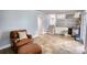 Cozy basement with tile flooring, wet bar, and access to the backyard at 493 James Street Sw, Lilburn, GA 30047