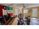 Unfinished storage room with clutter and assorted items, featuring white door and window at 493 James Street Sw, Lilburn, GA 30047