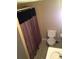 Cozy bathroom with a floral patterned shower curtain, toilet, and sink at , Marietta, GA 30008