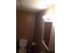 Compact bathroom with a white toilet, vanity, mirror, and a standard ceiling at , Marietta, GA 30008