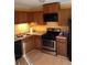 Well-lit kitchen features stainless steel appliances, stylish flooring, and ample cabinet space at , Marietta, GA 30008