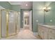 Bathroom showcasing a stand up shower and cabinet space at 1418 Brighton Pl, Loganville, GA 30052