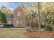 Attractive brick home showcases traditional architecture and mature landscaping enhancing its curb appeal at 1418 Brighton Pl, Loganville, GA 30052
