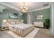 Elegant main bedroom with soft lighting, a plush bed, and stylish decor at 1418 Brighton Pl, Loganville, GA 30052