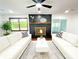Bright living room with modern sofas and fireplace at 144 Morning Creek Rd, Jonesboro, GA 30238