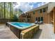 A backyard with a spa, creating a serene outdoor space for relaxation and enjoyment at 2251 Everleigh Ln, Marietta, GA 30064