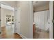 Bathroom features a vanity with a sink and a shower-tub combo and natural light shining in from a nearby window at 2251 Everleigh Ln, Marietta, GA 30064