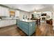 Kitchen island with plenty of room and an open floor plan that connects to the living room at 2251 Everleigh Ln, Marietta, GA 30064