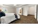Main bedroom with trey ceilings, adjacent bath and dressing room at 2251 Everleigh Ln, Marietta, GA 30064