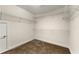 Empty walk-in closet with shelving and neutral carpet at 2251 Everleigh Ln, Marietta, GA 30064