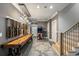 Finished basement with a shuffleboard table, arcade game, and exposed light fixtures at 542 Orme Ne Cir, Atlanta, GA 30306