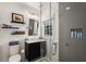Modern bathroom with glass shower, sleek vanity, and stylish fixtures at 542 Orme Ne Cir, Atlanta, GA 30306