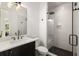Modern bathroom with a glass-enclosed shower, stylish vanity, and sleek fixtures at 542 Orme Ne Cir, Atlanta, GA 30306