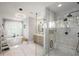 Luxurious bathroom with standalone tub, glass shower, and modern vanity at 542 Orme Ne Cir, Atlanta, GA 30306