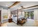 Bright bedroom with four poster bed, neutral color scheme, and an abundance of natural light at 542 Orme Ne Cir, Atlanta, GA 30306