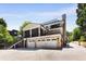 Elegant two-story home with a brick facade, two-car garage and a screened in deck for outdoor entertaining at 542 Orme Ne Cir, Atlanta, GA 30306