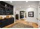 Stylish living area with custom cabinetry, hardwood floors, and elegant decor at 542 Orme Ne Cir, Atlanta, GA 30306