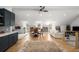 Open floor plan features kitchen, dining, and living spaces, seamlessly integrating a modern lifestyle at 542 Orme Ne Cir, Atlanta, GA 30306