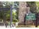 Welcoming entrance to Piedmont Park, highlighting stone gate and easy access to the park at 542 Orme Ne Cir, Atlanta, GA 30306