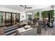 Outdoor patio with a seating and dining areas and a fireplace with views to the backyard at 542 Orme Ne Cir, Atlanta, GA 30306